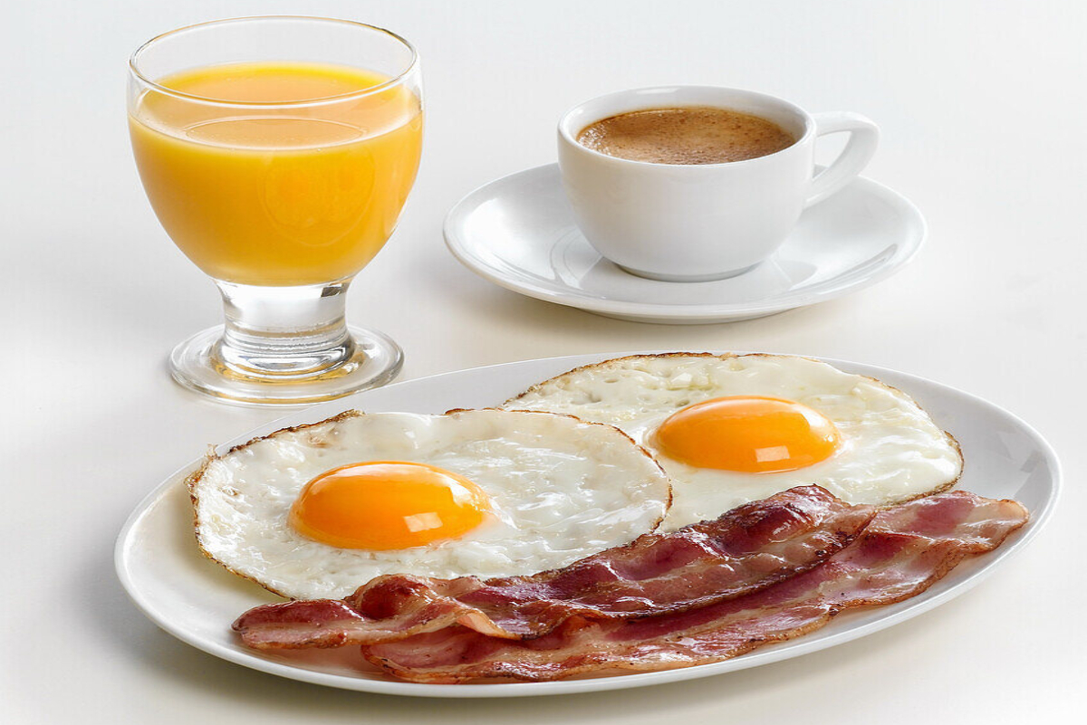 Breakfast-with-bacon-fried-eggs-orange-juice-and-coffee